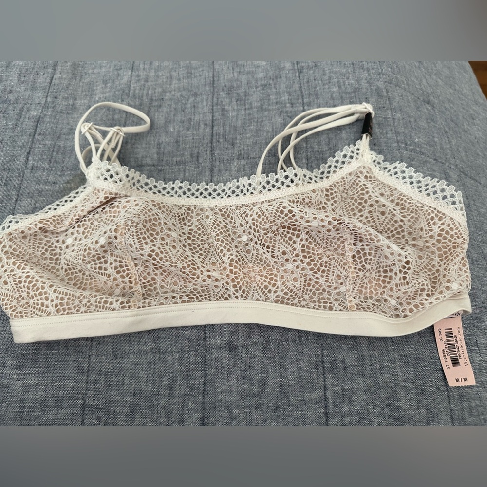 NWT Victoria’s Secret bralette in a delicate cream lace with nude lining. Medium